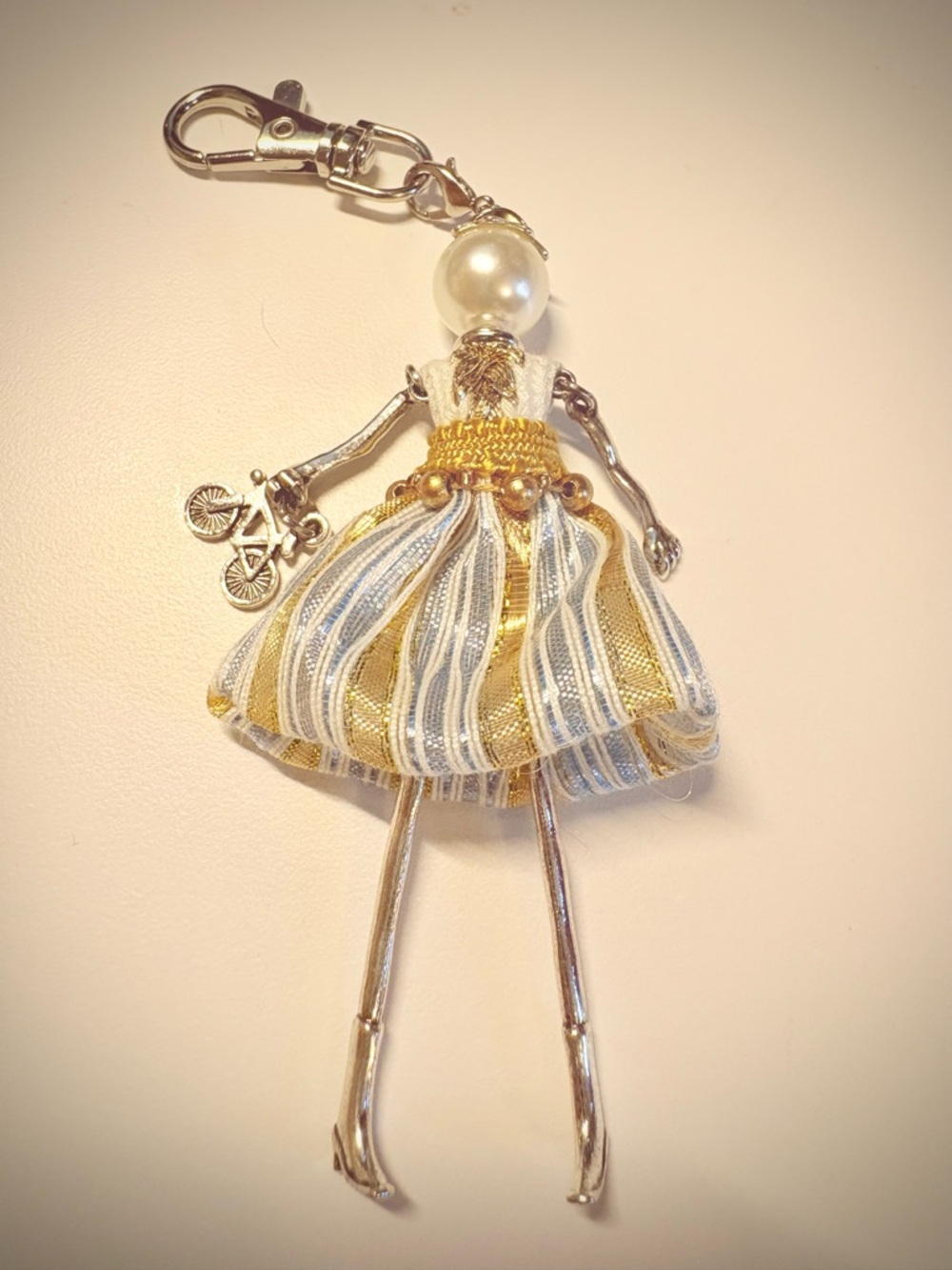 Pearl-Head Doll Keychain with Gold & Blue Striped Dress